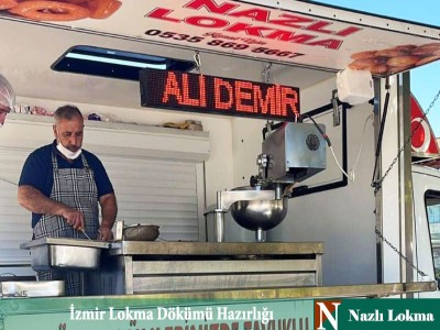 Kemal Usta gezici araçta lokma makinesinin başında döküme hazırlanıyor